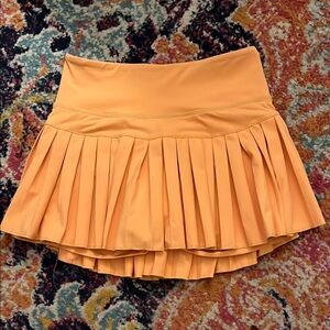 Goldhinge Pleated Orange Skirt